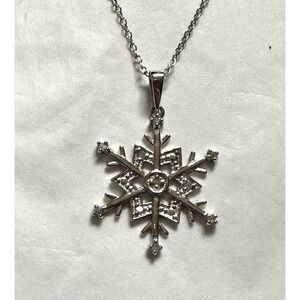 Sterling Silver And Diamond Snowflake Pendant Necklace